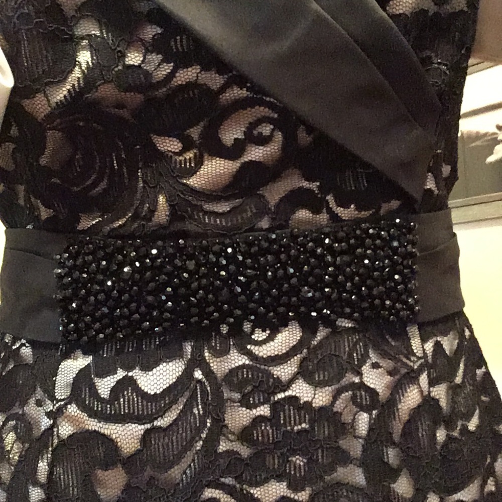 Black lace cap sleeve dress with ivory lining